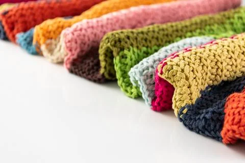 Close-up of knitted wool blanket on white background. Stock Photos