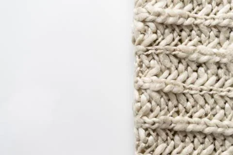 Close-up of knitted wool blanket on white background. Stock Photos
