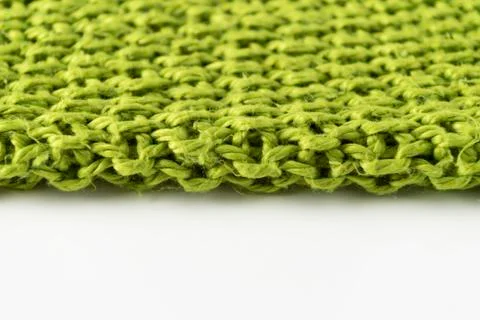 Close-up of knitted wool blanket on white background. Stock Photos