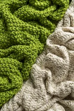 Close-up of knitted wool blankets on white background. Stock Photos