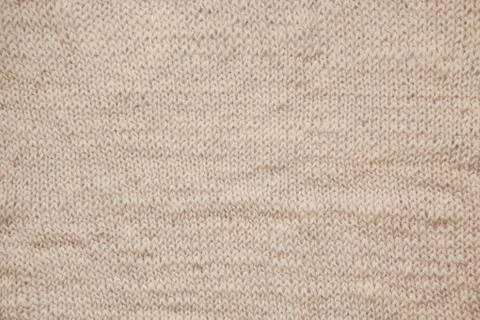 Close up of knitting beige textured wool background, vintage old style Stock Photos