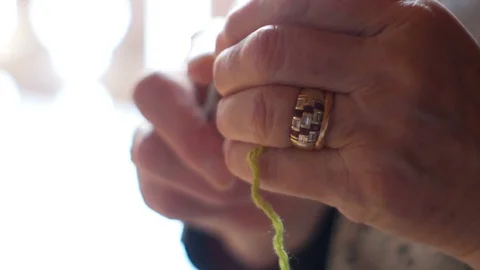 Close up on knitting hands Stock Footage 84884915