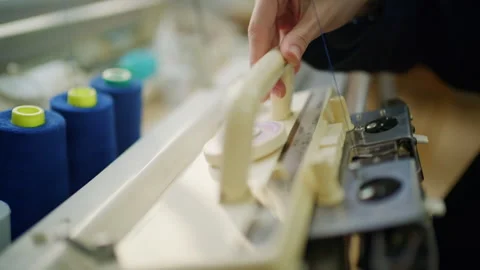 Close up of a knitting machine with metal needles, numbered measuring rail, Видео 335289275