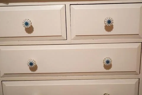 Close up of knobs in a chest of drawers 库存照片