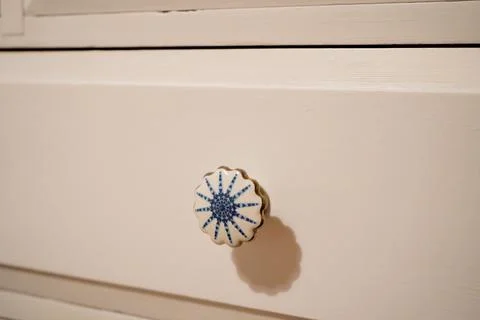 Close up of knobs in a chest of drawers Stock Photos