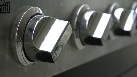 Close up of knobs on a silver outdoor grill Stock Footage 84289681
