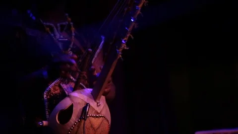 Close up of kora player performing on stage Stock Footage 98743078
