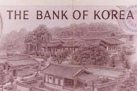 Close-up of Korean Banknote with Text and Traditional Buildings. Stock Illustration