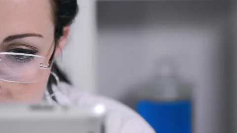 Close up of lab technician using tablet computer 스톡 동영상 199630130