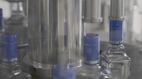 Close-up of labeling while bottling drinks. Stock Footage 163207723