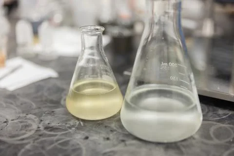 Close up of Laboratory Flasks Glassware with sample Stock Photos