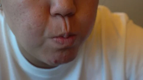Close-Up Lady Face Chewing And Swallowing Slice Of fresh salad. Stock Footage 107543455