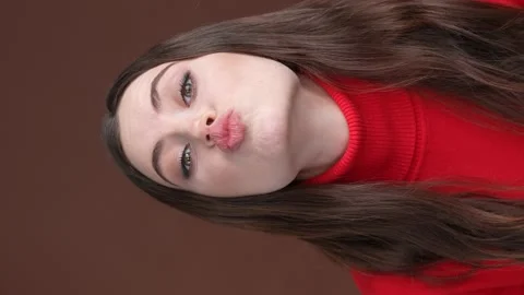 Close up lady have video record make face isolated brown color background Stock Footage 189495413