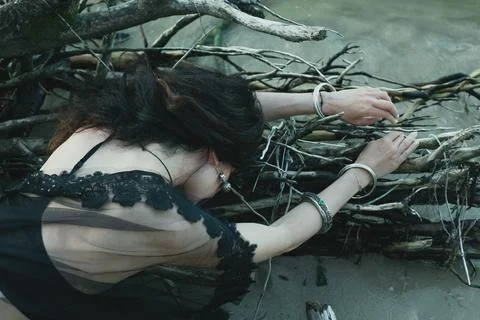 Close up lady lying on tree roots concept photo Stock Photos
