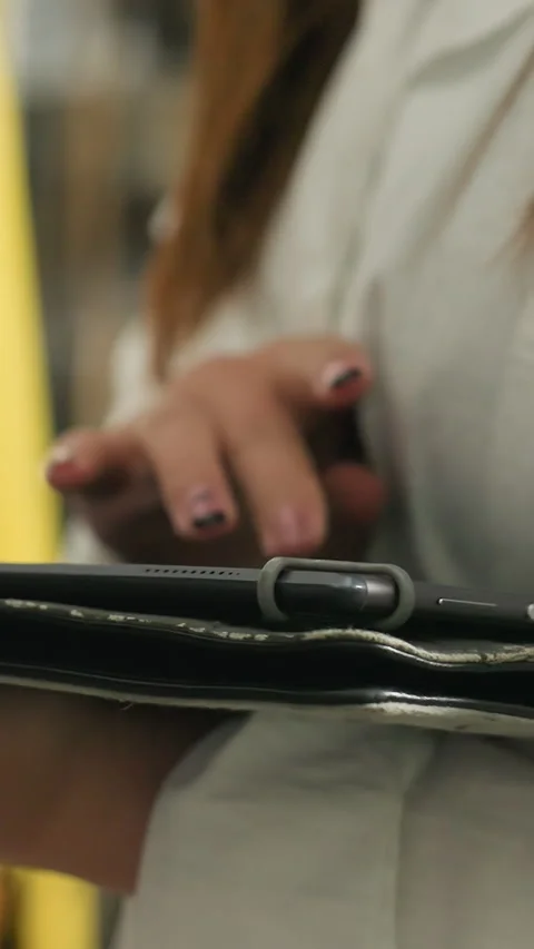 Close-Up of Lady Using Tablet in Mechanical Workshop Stock Footage 318201453