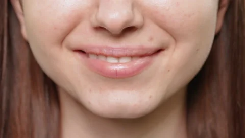 Close up lady's lips smiling Stock Footage 229703261