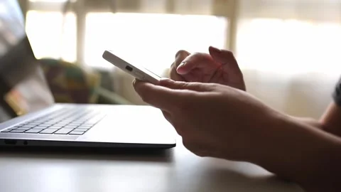 Close up of a lady's typing on her phone with both hands Stock Footage 244843981