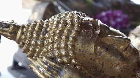 Close up of laid Buddha statue inside a temple in Bangkok Video stock 75538582