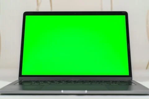 Close up of a laptop computer with green screen Stock Photos