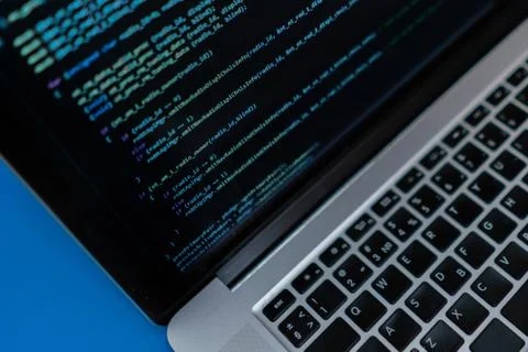 Close up laptop computer screen with a programming code creating 写真素材