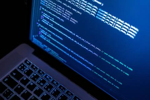 Close up laptop computer screen with a programming code creating 写真素材