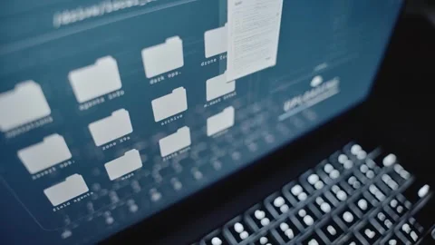 Close up laptop computer screen - secret files and folders uploaded to cloud Stock Footage 311538075