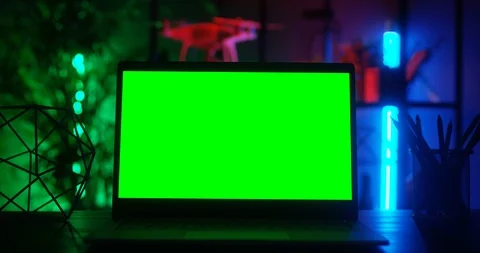 Close up of the laptop computer on the table in the darkness and interior of the 스톡 동영상 104982696