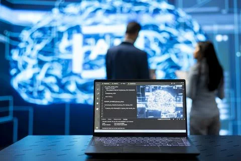 Close up of laptop displaying artificial intelligence code Fotos de archivo