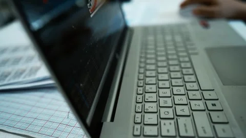 Close-Up of Laptop Keyboard with Blurred Screen, Close-up of a laptop keybo.. Stock Footage 304978265