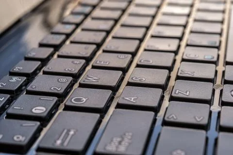 Close-up of laptop keyboard focus on button Stock Photos