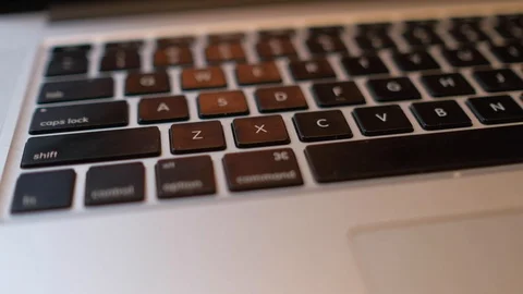 Close-up of laptop keyboard with focus buttons key Stock Footage 98978586