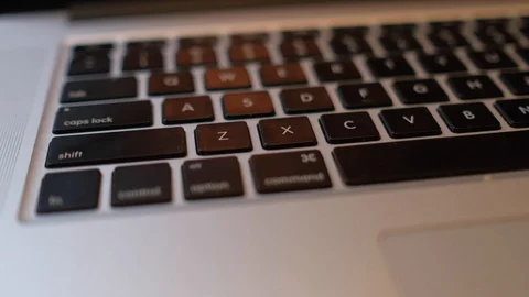 Close-up of laptop keyboard with focus buttons key Stock Footage 98978665