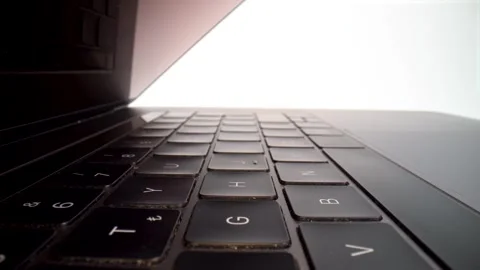 Close up of laptop keyboard keys on white background isolated Stock Footage 328428790