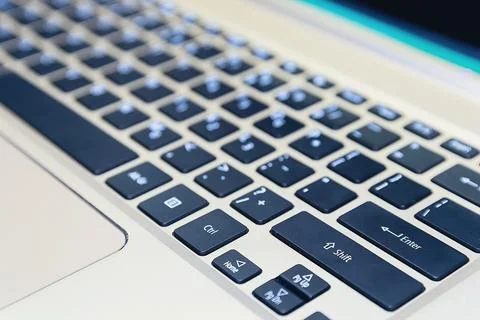 Close-up of a laptop keyboard. Stock Photos