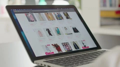 Close-up of Laptop Screen Displaying Online Shopping Website Stock Footage 336528179