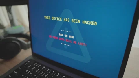 Close up on laptop screen as message appears requesting payment to hacker group 스톡 동영상 342512240