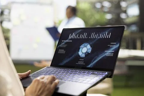 Close up of laptop screen showing data presentation dashboard Stock Photos