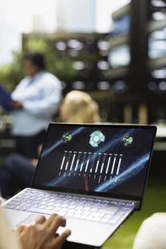 Close up of laptop screen showing data presentation dashboard with metrics Stock Photos