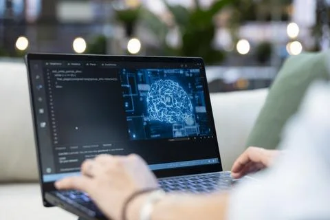 Close up of laptop screen with source code and AI cloud computing Fotos de archivo