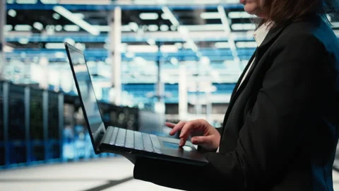 Close up of laptop software used by data center admin to do troubleshooting Stock Footage 329324572
