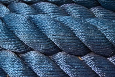 Close-up of the large blue rope knitted. Stock Photos