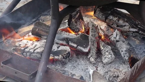 Close up of large cauldron with food on the fire. Stock Footage 106610883
