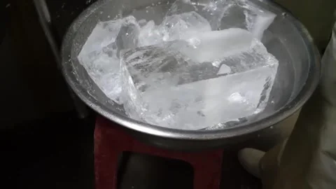 Close-up of Large Clear Ice Blocks in Stainless Steel Bowl at Korean Fish Market Stock Footage 337374584