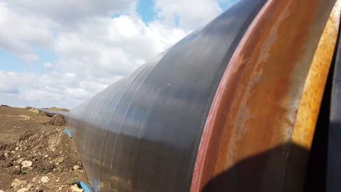 Close up large diameter welded metal pipes Stock Footage 125309015
