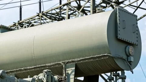 Close-Up of Large Electrical Transformer Tank and Components Stock Photos