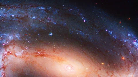 Close up Large galaxy with space particles and stars around a fiery core Panning Stock Footage 154141165