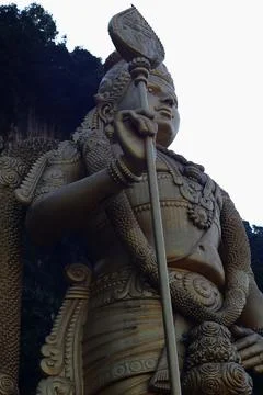 Close-up of a large Hindu deity statue at Batu Caves, Malaysia Stock Photos