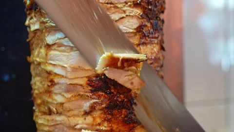 Close Up of Large Meat With Spatula Stock Footage 268714240