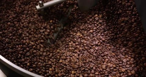 Close-up of large metal vat for roasting coffee beans. The rotating mechanism Stock Footage 239058261