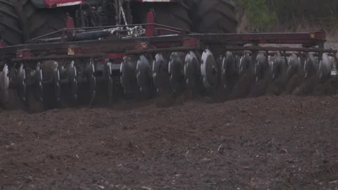 Close-up of a large modern plow red color Stock Footage 316515967